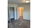 Spacious bedroom with carpet and an ensuite bathroom at 4778 Sparkling Shell Ave, Kissimmee, FL 34746