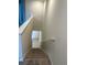 Carpeted staircase leading down to the lower level at 4778 Sparkling Shell Ave, Kissimmee, FL 34746