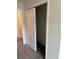 Bedroom closet with sliding door and shelving at 4778 Sparkling Shell Ave, Kissimmee, FL 34746