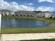 Waterfront townhomes with serene pond views at 4778 Sparkling Shell Ave, Kissimmee, FL 34746