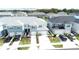 Aerial view of townhouses with two-car garages and landscaped yards at 4778 Sparkling Shell Ave, Kissimmee, FL 34746