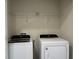 Laundry room with Whirlpool washer and dryer at 4778 Sparkling Shell Ave, Kissimmee, FL 34746