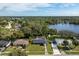 House, large backyard, and lake view from above at 1533 Findlay St, Deltona, FL 32725