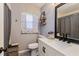 Updated bathroom with white vanity and gray walls at 1533 Findlay St, Deltona, FL 32725