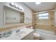 Clean bathroom with a shower/tub combo and updated vanity at 280 Westwood Ave, Winter Haven, FL 33880