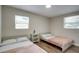 Bedroom with two twin beds and a nightstand at 280 Westwood Ave, Winter Haven, FL 33880