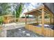 Peaceful backyard with a pergola and seating area at 280 Westwood Ave, Winter Haven, FL 33880