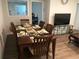 Elegant dining room with a large wood table and six chairs at 280 Westwood Ave, Winter Haven, FL 33880