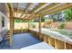 Covered patio with seating area and outdoor bar at 280 Westwood Ave, Winter Haven, FL 33880