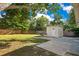 Spacious backyard with storage shed and patio at 2825 Mayer St, Orlando, FL 32806