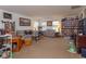 Spacious living room with ample natural light and built-in shelving at 315 Aldridge Ln, Davenport, FL 33897