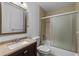 Clean bathroom with tub, shower, and granite vanity at 3390 Cedar Spring Pl # 163, Winter Park, FL 32792