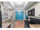 Modern kitchen featuring stainless steel appliances and a breakfast bar at 3390 Cedar Spring Pl # 163, Winter Park, FL 32792