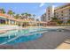 Resort-style pool with surrounding lounge chairs at 5300 S Atlantic Ave # 2-502, New Smyrna Beach, FL 32169