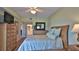 Main bedroom with queen bed and ensuite bathroom access at 5300 S Atlantic Ave # 2-502, New Smyrna Beach, FL 32169