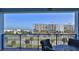 Ocean and building view from a condo balcony with patio furniture at 5300 S Atlantic Ave # 2-502, New Smyrna Beach, FL 32169