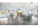 Bright and airy community room with kitchenette at 5300 S Atlantic Ave # 2-502, New Smyrna Beach, FL 32169