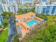 Community pool and clubhouse with ocean views at 5300 S Atlantic Ave # 2-502, New Smyrna Beach, FL 32169