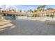 Resort-style pool with plenty of lounge chairs and covered seating areas at 5300 S Atlantic Ave # 2-502, New Smyrna Beach, FL 32169