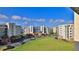 Complex of buildings with ample parking and grassy areas at 5300 S Atlantic Ave # 2-502, New Smyrna Beach, FL 32169