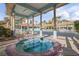 Relaxing hot tub in a covered outdoor area at 5300 S Atlantic Ave # 2-502, New Smyrna Beach, FL 32169