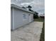 View of the detached structure and concrete patio at 603 Maggie Cir, Winter Haven, FL 33880