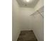Large walk-in closet with wire shelving at 603 Maggie Cir, Winter Haven, FL 33880
