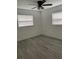 Bright bedroom with ceiling fan and vinyl plank flooring at 603 Maggie Cir, Winter Haven, FL 33880