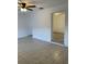 Open living area with tile floors and access to other rooms at 603 Maggie Cir, Winter Haven, FL 33880