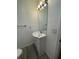 Bathroom with vanity, mirror, and vinyl flooring at 603 Maggie Cir, Winter Haven, FL 33880