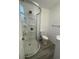 Bathroom with a large shower and vinyl plank flooring at 603 Maggie Cir, Winter Haven, FL 33880