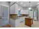 Kitchen features granite countertops, stainless steel appliances, and an island at 8407 River Branch Pl, Sanford, FL 32771