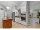 Modern kitchen with granite countertops and stainless steel appliances at 8407 River Branch Pl, Sanford, FL 32771
