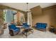 Cozy patio area with wicker furniture and a view of the pool at 8407 River Branch Pl, Sanford, FL 32771