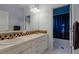 Charming bathroom with double sinks and a shower/tub combo at 8407 River Branch Pl, Sanford, FL 32771