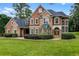 Two-story house with stone and stucco exterior at 8407 River Branch Pl, Sanford, FL 32771