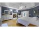 Spacious Primary bedroom with fireplace and hardwood floors at 8407 River Branch Pl, Sanford, FL 32771
