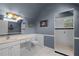 Nautical-themed bathroom with a walk-in shower and single vanity at 8407 River Branch Pl, Sanford, FL 32771