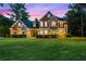 Two-story house with stone accents and landscaping at 8407 River Branch Pl, Sanford, FL 32771