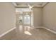 Bright and airy living room with tile floors and high ceilings at 8681 Crested Eagle Pl, Sanford, FL 32771
