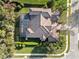 Bird's-eye view of a single Gathering home with a pool and landscaped yard at 8681 Crested Eagle Pl, Sanford, FL 32771
