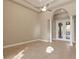 Bright living room with tile floors and access to a covered patio at 8681 Crested Eagle Pl, Sanford, FL 32771