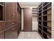 Large walk-in closet with ample shelving and hanging space at 8681 Crested Eagle Pl, Sanford, FL 32771
