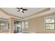 Open and bright dining area with sliding glass doors leading to the patio at 8681 Crested Eagle Pl, Sanford, FL 32771
