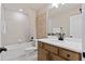 Clean bathroom with a single vanity and bathtub at 10274 Hadley St, Orlando, FL 32829