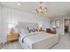 Spacious main bedroom with stylish decor and large windows at 10274 Hadley St, Orlando, FL 32829