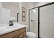 Modern bathroom with a glass shower and updated vanity at 10274 Hadley St, Orlando, FL 32829