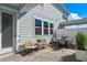 Relaxing patio with seating area and adjacent to the house at 10274 Hadley St, Orlando, FL 32829