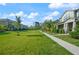 Landscaped community with sidewalks and townhouses at 13330 Abuela Aly, Windermere, FL 34786