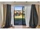 View of backyard from sliding glass doors at 1836 N Crystal Lake Dr # 31, Lakeland, FL 33801